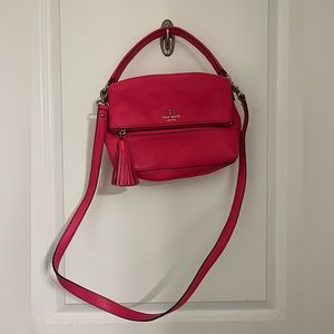 Hot pink Kate spade crossbody purse with tassel